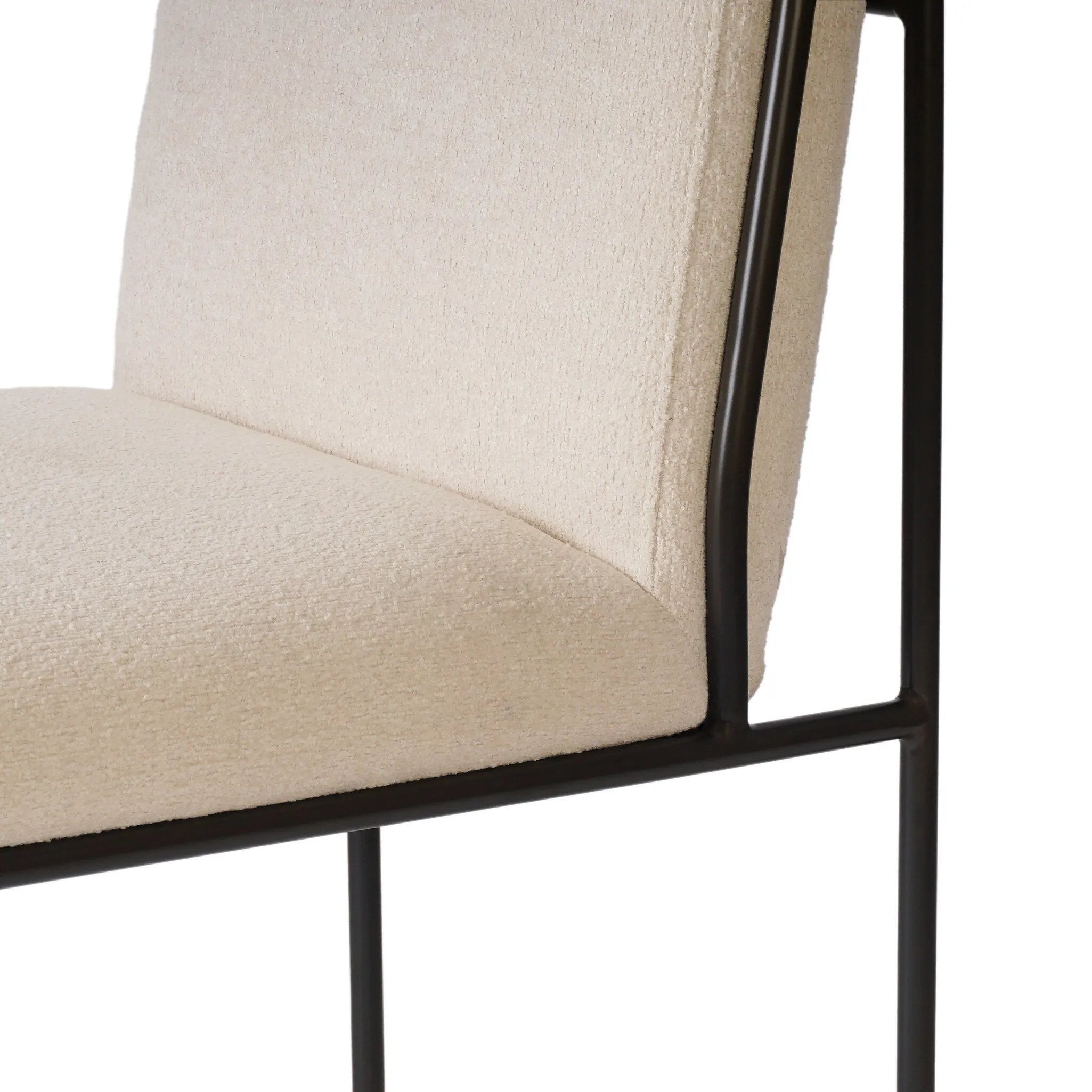 European inspiration gives streamlined character to this high-back metal-framed dining chair. Bent metal detail and tapered f
