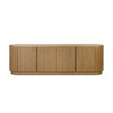 Crafted from desert oak solids and veneers with a plinth-style base, rounded sides and linear reeding, this sideboard exudes midcentury vibes. Fully finished interior and shelves for quality detailing inside and out Amethyst Home provides interior design, new home construction design consulting, vintage area rugs, and lighting in the Dallas metro area.