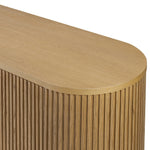 Crafted from desert oak solids and veneers with a plinth-style base, rounded sides and linear reeding, this sideboard exudes midcentury vibes.  Fully finished interior and shelves for quality detailing inside and out Amethyst Home provides interior design, new home construction design consulting, vintage area rugs, and lighting in the Winter Garden metro area.