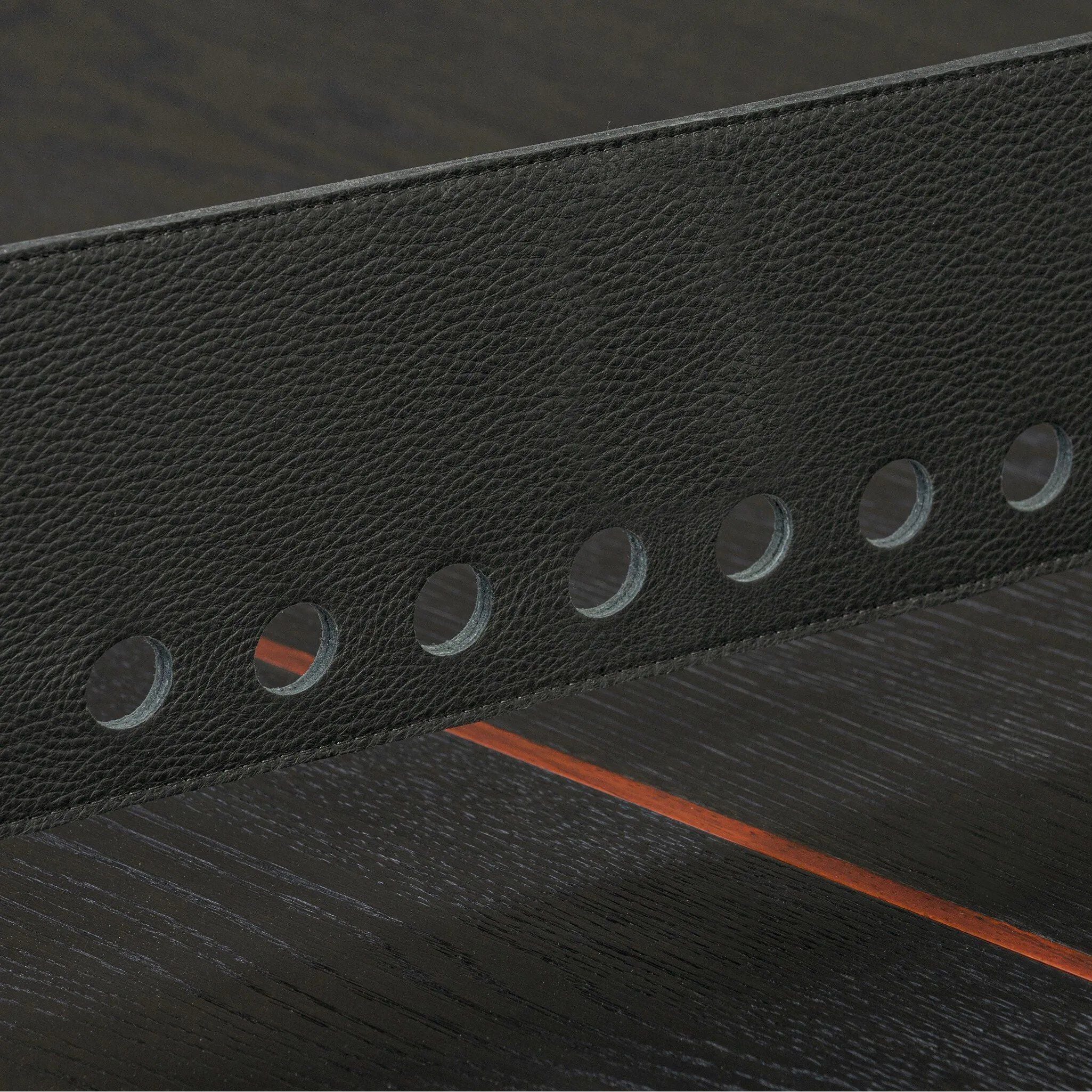 Dual-function fun is the star of this ping pong table from District Eight. Its light minimalist design channels industrial features like an oak plane top, cast iron legs and a leather sling net attached with steel clamps, which can be easily removed to become a dining table that seats 12. Amethyst Home provides interior design, new home construction design consulting, vintage area rugs, and lighting in the Calabasas metro area.