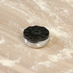 Material-driven for fun, this shuffleboard table features a hand-stitched leather landing surface, laminated solid oak game board — finished in a durable lacquer — and industrial trestle-style, cast iron legs. Climatic adjusters for leveling with ease. Each table comes with carved wood and steel pucks, as well as a steel ring scoring mechanism. Amethyst Home provides interior design, new home construction design consulting, vintage area rugs, and lighting in the Park City metro area.