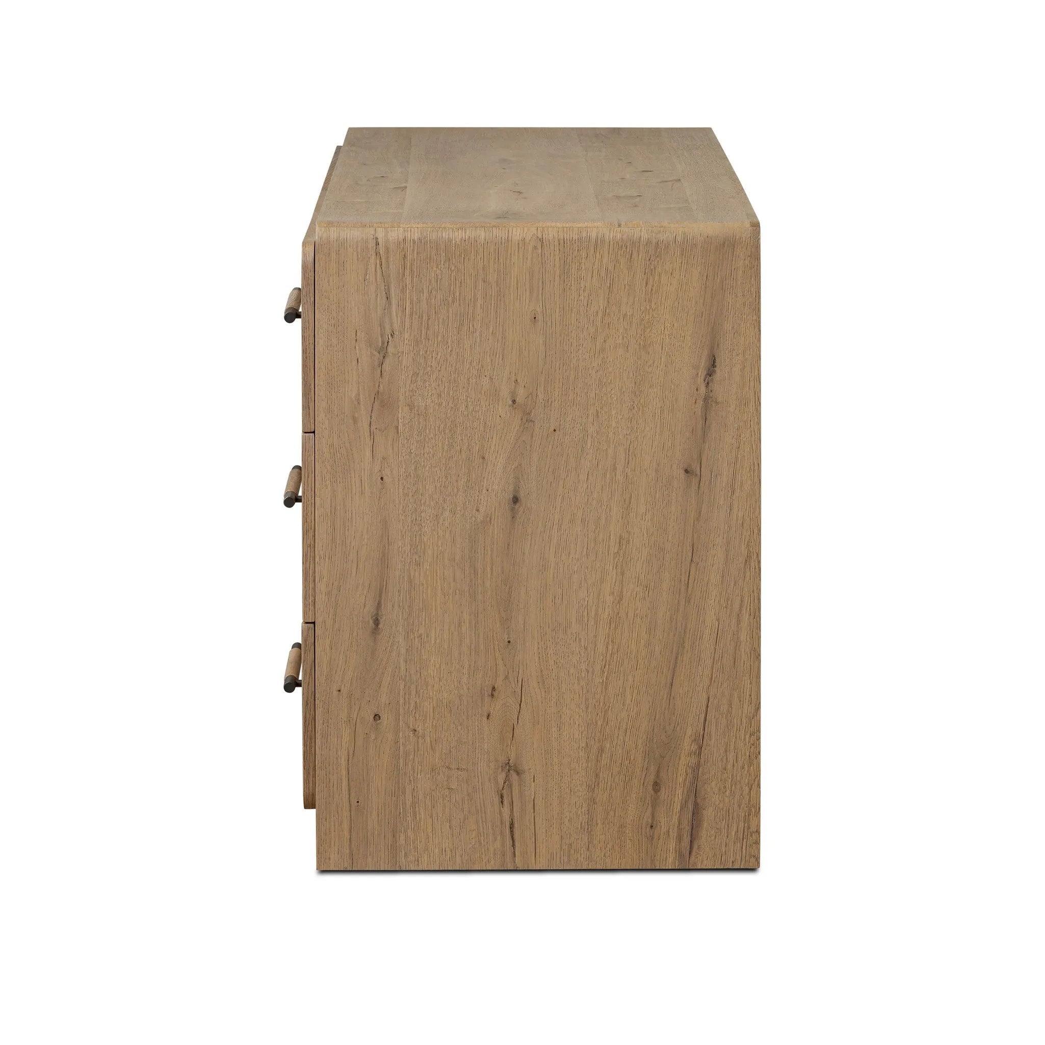 Simple and spacious, this oak dresser has six drawers paired with aged bronze and wood hardware. Waterfall shaping and soft-close undermount glides give a smooth finish Amethyst Home provides interior design, new home construction design consulting, vintage area rugs, and lighting in the Los Angeles metro area.