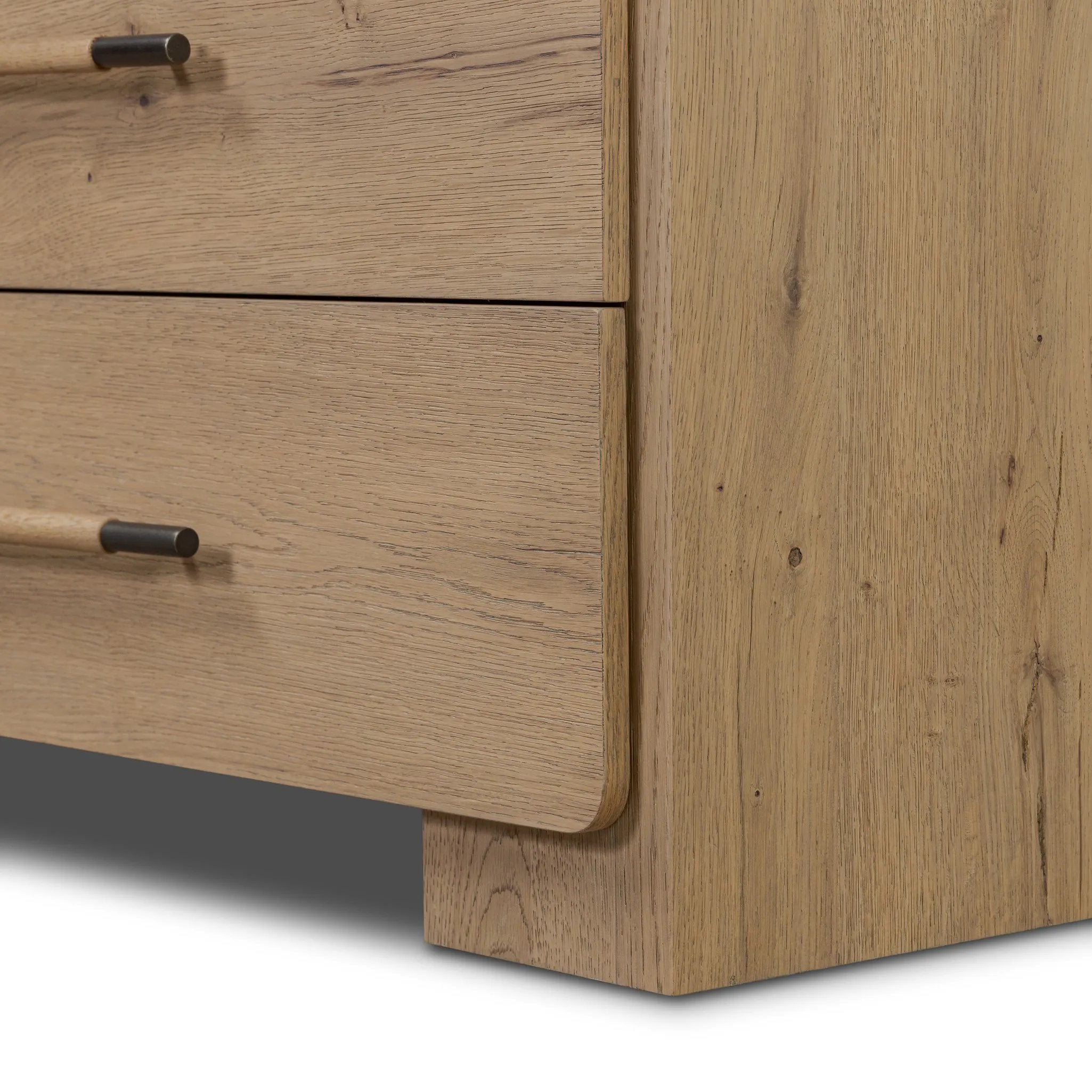 Simple and spacious, this oak dresser has six drawers paired with aged bronze and wood hardware. Waterfall shaping and soft-close undermount glides give a smooth finish Amethyst Home provides interior design, new home construction design consulting, vintage area rugs, and lighting in the Salt Lake City metro area.