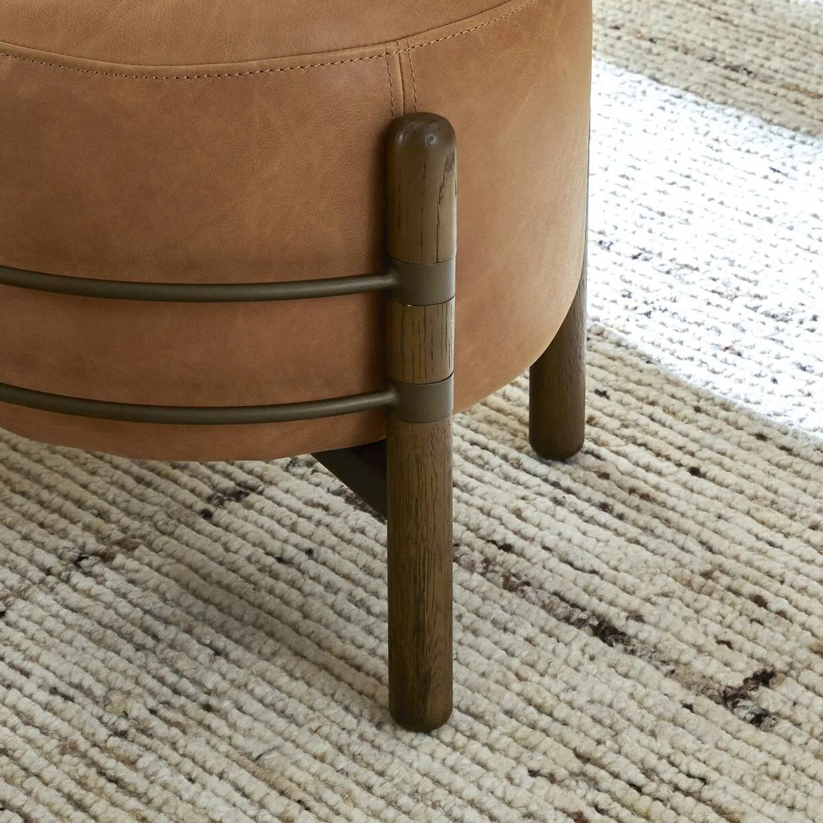 Featuring Enfield Palermo Cognac Ottoman by Four Hands at Amethyst Home. Expertly crafted with high-quality materials, the Enfield Palermo Cognac Ottoman is the ultimate addition to any living space. Its versatile design allows for use as a footrest, extra seating, or even storage. Made with precision and style, this ottoman brings both elegance and functio. Amethyst Home provides interior design, new home construction design consulting, vintage area rugs, and lighting in the Charlotte metro area.