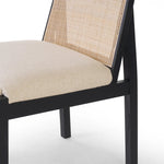 Featuring Esmee Antwerp Natural Dining Chair by Four Hands at Amethyst Home. Ebony nettlewood shapes the arched, angled back of this simply shaped, armless dining chair. Natural crosshatch cane adds a light texture to complement the creamy, neutral upholstered seat. Performance fabrics are specially created to withstand spills, stains, high traffic and wear, en. Amethyst Home provides interior design, new home construction design consulting, vintage area rugs, and lighting in the Miami metro area.