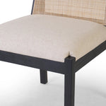 Featuring Esmee Antwerp Natural Dining Chair by Four Hands at Amethyst Home. Ebony nettlewood shapes the arched, angled back of this simply shaped, armless dining chair. Natural crosshatch cane adds a light texture to complement the creamy, neutral upholstered seat. Performance fabrics are specially created to withstand spills, stains, high traffic and wear, . Amethyst Home provides interior design, new home construction design consulting, vintage area rugs, and lighting in the Seattle metro area.