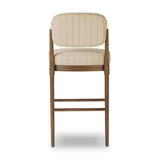 Featuring Esther Lavon Flint Bar + Counter Stool by Four Hands at Amethyst Home. Modern materials place an updated twist on the traditional bar stool. Linen/cotton blend cushioning features a faint pinstripe for a unique-while-versatile look. Simply framed by brown oak and perfect in pairs or multiples. Overall Dimensions: Counter:
21.25"w x 24.25"d x 40.00"h
 . Amethyst Home provides interior design, new home construction design consulting, vintage area rugs, and lighting in the Miami metro area.