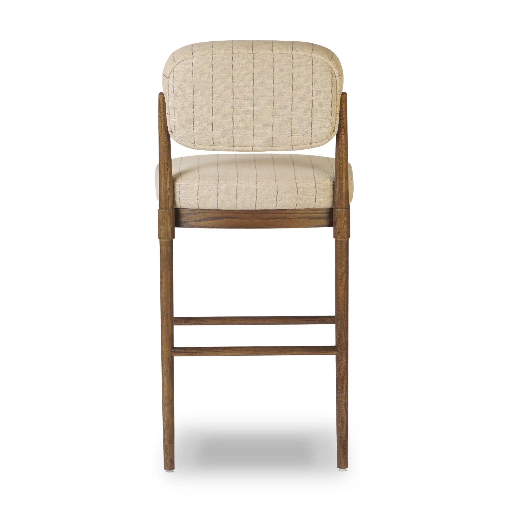 Featuring Esther Lavon Flint Bar + Counter Stool by Four Hands at Amethyst Home. Modern materials place an updated twist on the traditional bar stool. Linen/cotton blend cushioning features a faint pinstripe for a unique-while-versatile look. Simply framed by brown oak and perfect in pairs or multiples. Overall Dimensions: Counter:
21.25"w x 24.25"d x 40.00"h
 . Amethyst Home provides interior design, new home construction design consulting, vintage area rugs, and lighting in the Miami metro area.