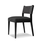 Featuring Ferris Gibson Black Dining Chair by Four Hands at Amethyst Home. Mixed materials at their finest. Black ash forms a slight, simple frame for squared seating of neutral performance-grade upholstery. Black top-grain leather backing takes this modern-minded dining chair to the next level.Overall Dimensions: 20.00"w x 22.00"d x 32.00"hWeight : 16.. Amethyst Home provides interior design, new home construction design consulting, vintage area rugs, and lighting in the Winter Garden metro area.