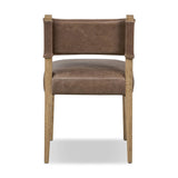 Featuring Ferris Palermo Cigar Dining Chair by Four Hands at Amethyst Home. Mixed materials at their finest. Brown parawood forms a slight, simple frame for squared seating of neutral performance-grade upholstery. Charcoal top-grain leather backing takes this modern-minded dining chair to the next level.Overall Dimensions: 20.00"w x 22.00"d x 32.00"hWeight . Amethyst Home provides interior design, new home construction design consulting, vintage area rugs, and lighting in the Calabasas metro area.