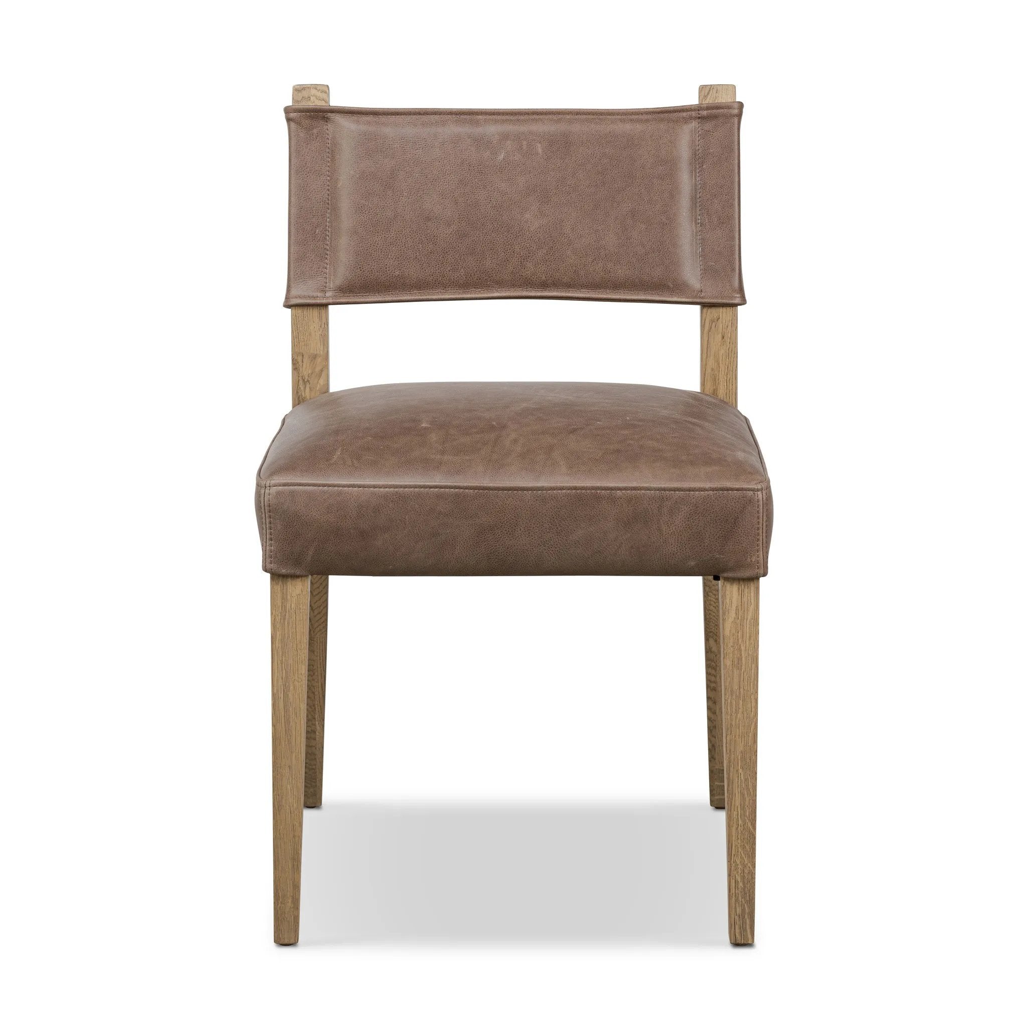 Featuring Ferris Palermo Cigar Dining Chair by Four Hands at Amethyst Home. Mixed materials at their finest. Brown parawood forms a slight, simple frame for squared seating of neutral performance-grade upholstery. Charcoal top-grain leather backing takes this modern-minded dining chair to the next level.Overall Dimensions: 20.00"w x 22.00"d x 32.00"hWeight : 1. Amethyst Home provides interior design, new home construction design consulting, vintage area rugs, and lighting in the Dallas metro area.