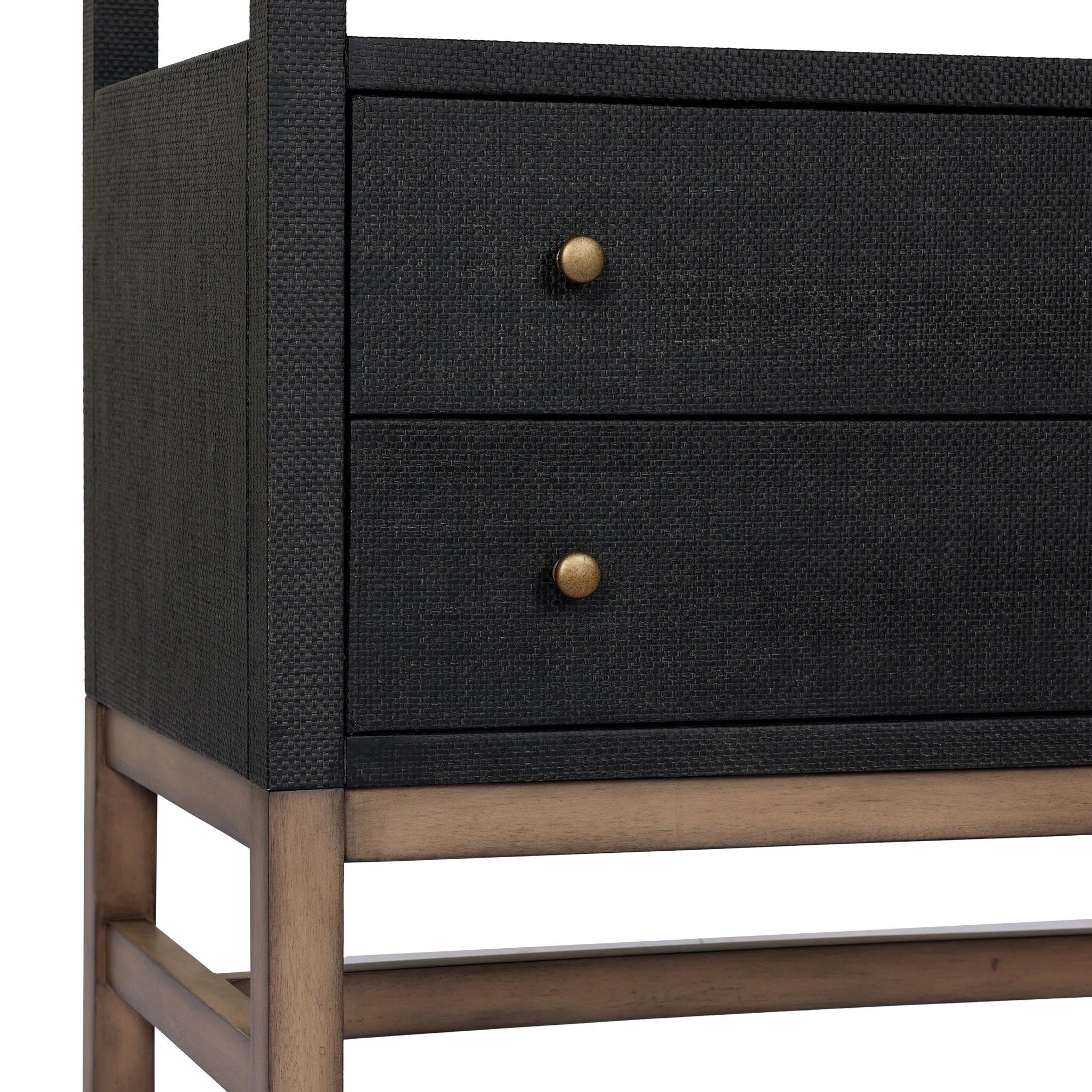 Woven black raffia drawers offer closed storage and a texture-driven take on book shelving. Antique brass-finished hardware adds a touch of vintage detailing, all framed within solid mahogany Amethyst Home provides interior design, new home construction design consulting, vintage area rugs, and lighting in the Boston metro area.