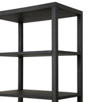 Woven black raffia drawers offer closed storage and a texture-driven take on book shelving. Antique brass-finished hardware adds a touch of vintage detailing, all framed within solid mahogany Amethyst Home provides interior design, new home construction design consulting, vintage area rugs, and lighting in the Houston metro area.