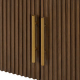 Featuring Fletcher Terra Brown Oak Media Console by Four Hands at Amethyst Home. Rich with reeding for texture and a linear look, this brown oak media console features four doors with brushed brass hardware and curved corners. Its top is a slab of bluestone, adding a striking material mix, while white mineral lines and natural variations mark the uniqueness of . Amethyst Home provides interior design, new home construction design consulting, vintage area rugs, and lighting in the Tampa metro area.