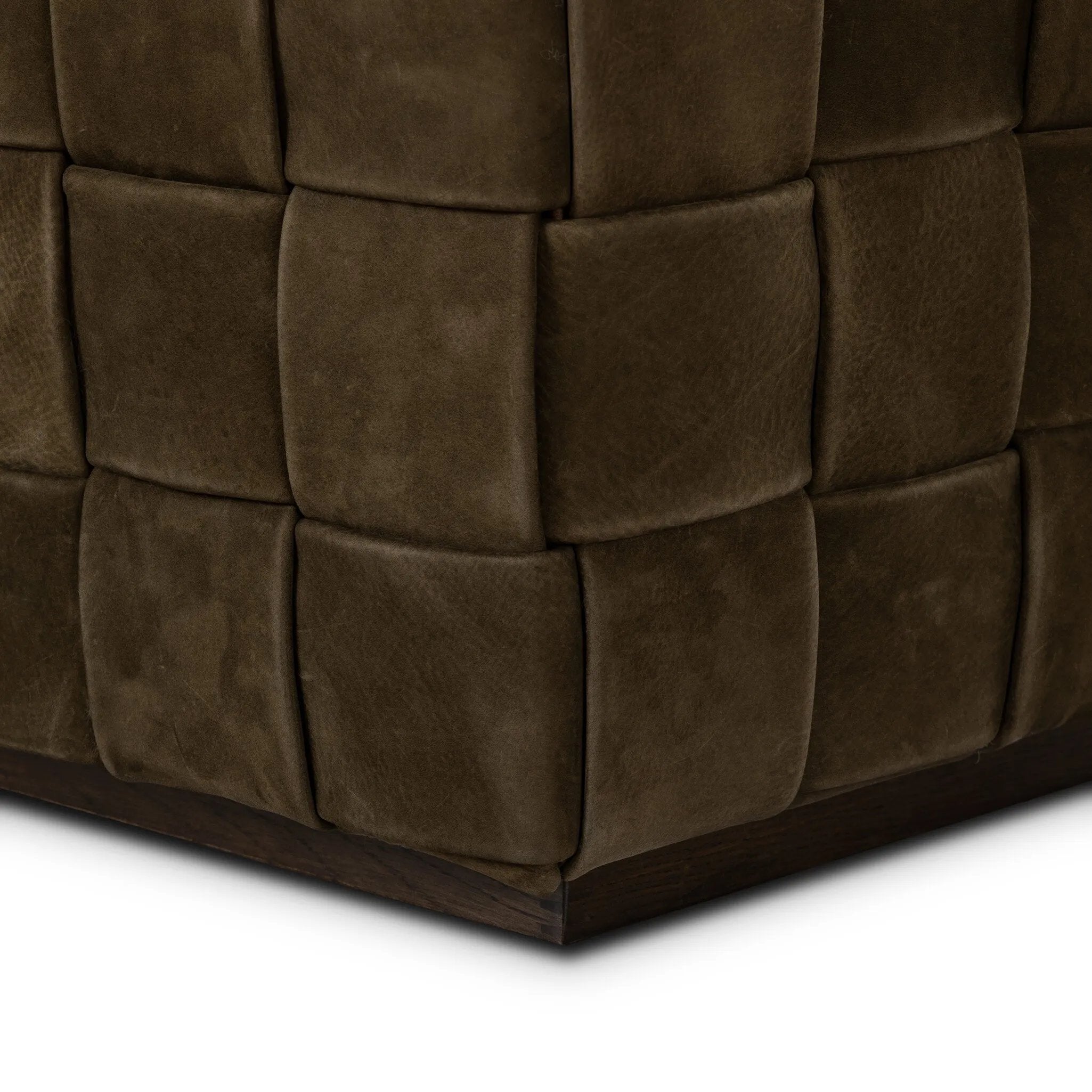 Soft, specialized top-grain leather is hand-woven, crafting a look of a treasured vintage find. Use as bonus seating or style with a tray for an extra surface Amethyst Home provides interior design, new home construction design consulting, vintage area rugs, and lighting in the Des Moines metro area.