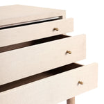 A soft statement console table with ample storage, inspired by a dresser silhouette. The elevated case is wrapped in painted linen and sits atop an oak base for a light and airy look Amethyst Home provides interior design, new home construction design consulting, vintage area rugs, and lighting in the Monterey metro area.