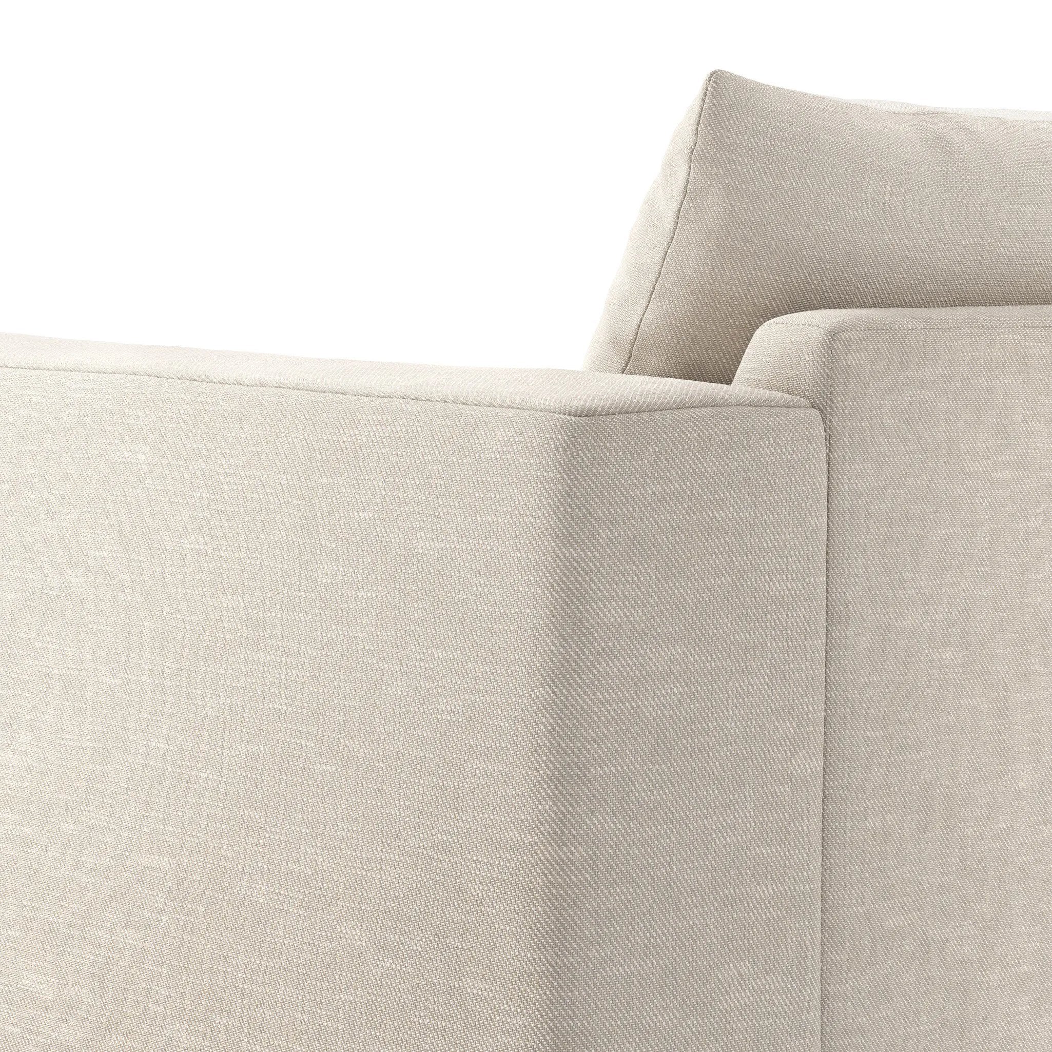 Welcome to the modern lounging essential. A timeless track arm sofa is upholstered in a neutral oatmeal performance fabric and finished with wooden block legs. Performance fabrics are specially created to withstand spills, stains, high traffic and wear, ensuring long-term comfort and unmatched durability Amethyst Home provides interior design, new home construction design consulting, vintage area rugs, and lighting in the San Diego metro area.