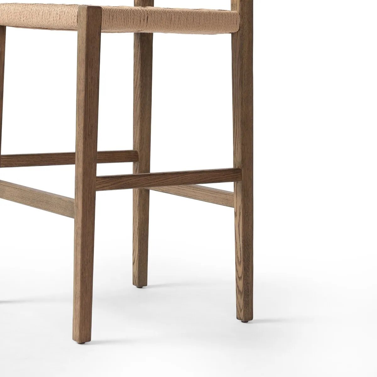 Featuring Hamlin Double Twisted Paper Cord Bar Stool by Four Hands at Amethyst Home. The Hamlin Double Twisted Paper Cord Bar Stool is expertly crafted with durable, high-quality materials. Its unique cord design provides both style and support, making it the perfect addition to any space. With its sturdy construction, this stool offers long-lasting use for . Amethyst Home provides interior design, new home construction design consulting, vintage area rugs, and lighting in the Portland metro area.