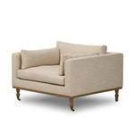 With traditional details like turned oak legs and brass casters, this low-profile accent chair features an elongated bench seat for an inviting sit. Performance fabric in neutral wheat finishes a knife-edge back and boxed arm cushions Amethyst Home provides interior design, new home construction design consulting, vintage area rugs, and lighting in the Laguna Beach metro area.