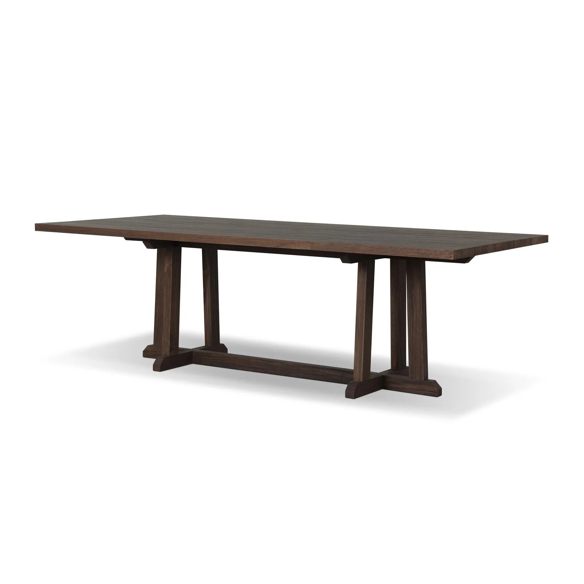 Subtly angled legs meet in a trestle-style stretcher base, pairing with a slatted top for a rustic-style outdoor dining table, also ideal for indoor spaces. Large chamfer details on the base and supports bring softness to FSC®-certified teak. Cover or store inside during inclement weather and when not in use Amethyst Home provides interior design, new home construction design consulting, vintage area rugs, and lighting in the Houston metro area.