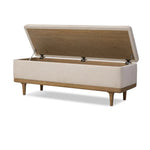 Wrapped in textural cream performance fabric, this spacious trunk doubles as seating at the foot of the bed — or anywhere. Store extra blankets, linens and more. Crafted from oak, the frame and tapered legs with Deco vibes are finished in a worn oak finish. Amethyst Home provides interior design, new home construction design consulting, vintage area rugs, and lighting in the Miami metro area.