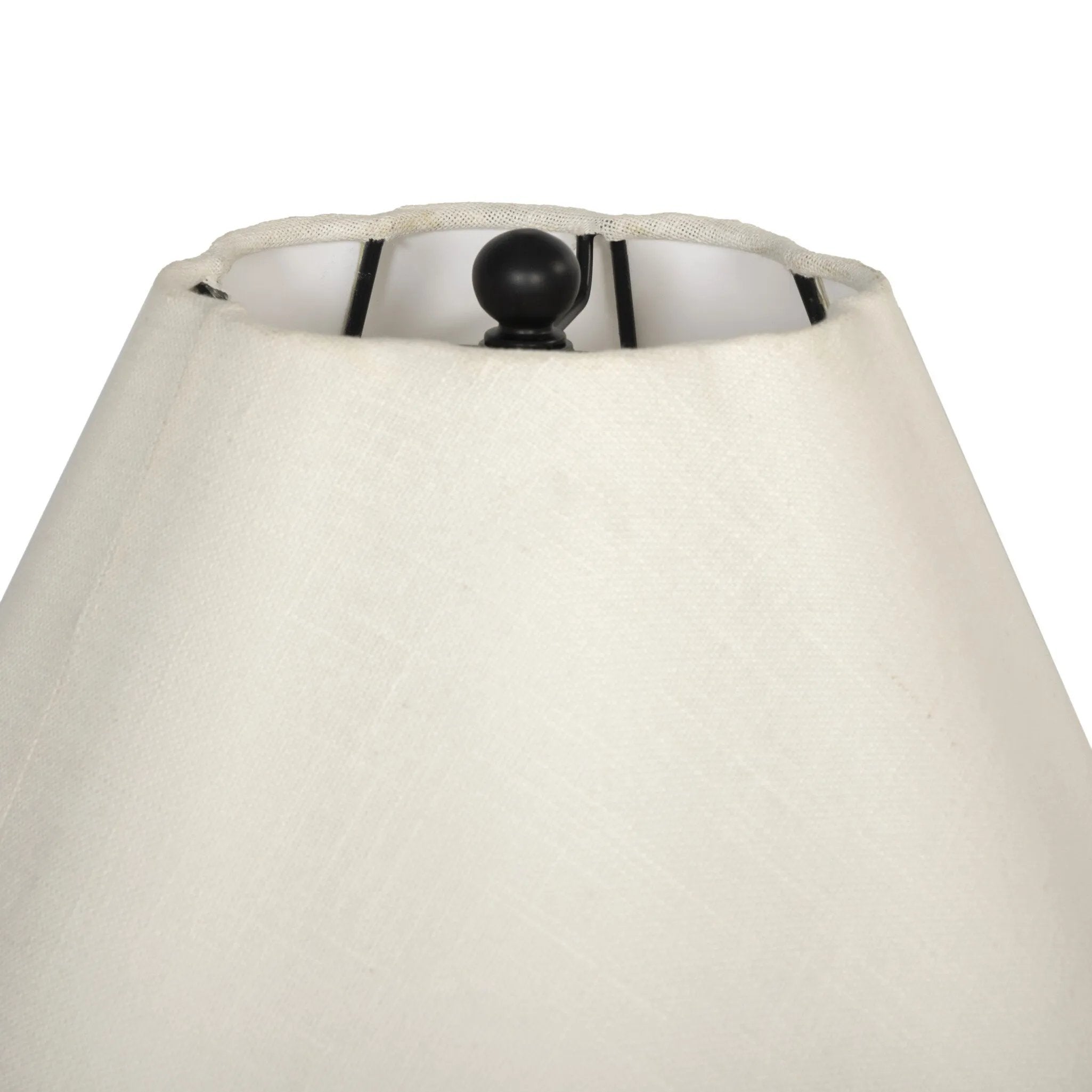 Slim in style, crisp with contrast. A black wrought iron base supports a cream-colored linen shade with scallop detailing Amethyst Home provides interior design, new home construction design consulting, vintage area rugs, and lighting in the Salt Lake City metro area.