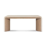 A thick layer of beige painted linen cascades this desk's soft waterfall shape in an eye-catching combination of texture. Crafted atop a mahogany and oak veneer base with rounded corners, this hardworking piece elevates the home-office workspace Amethyst Home provides interior design, new home construction design consulting, vintage area rugs, and lighting in the Tampa metro area.