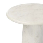 A dome-shaped pedestal base supports a rounded tabletop with bullnose edges. Made from cast white-finished concrete Amethyst Home provides interior design, new home construction design consulting, vintage area rugs, and lighting in the Dallas metro area.