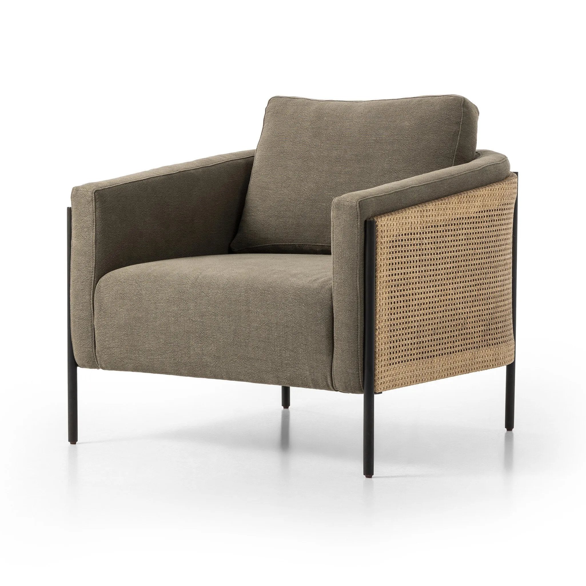 On-trend and expertly tailored, a texture-driven chair is upholstered in an olive flax/linen blend and wrapped with natural rattan, with linear iron legs finished in a complementary gunmetal Amethyst Home provides interior design, new home construction design consulting, vintage area rugs, and lighting in the Charlotte metro area.