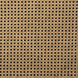 On-trend and expertly tailored, a texture-driven chair is upholstered in an olive flax/linen blend and wrapped with natural rattan, with linear iron legs finished in a complementary gunmetal Amethyst Home provides interior design, new home construction design consulting, vintage area rugs, and lighting in the Tampa metro area.