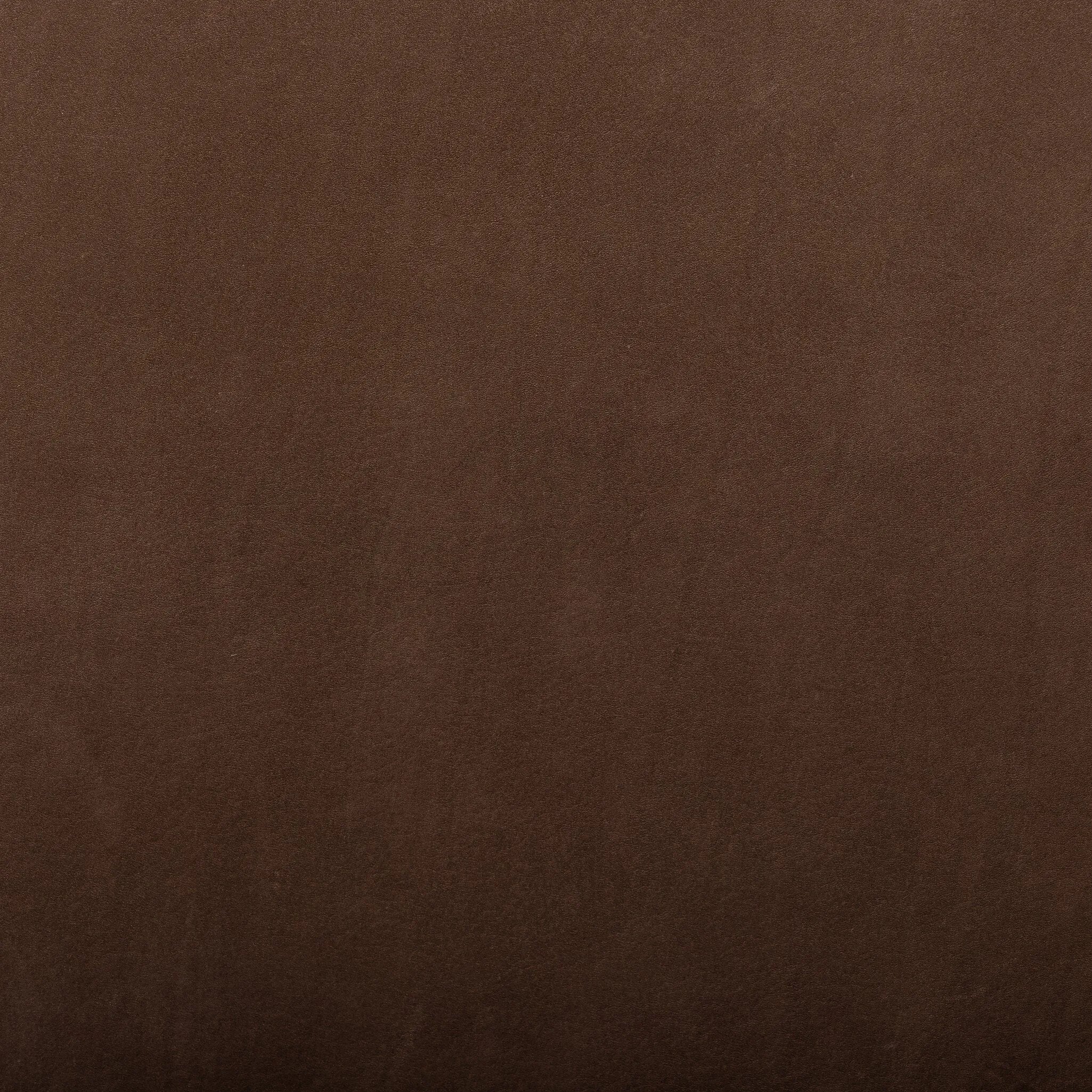 A midcentury-inspired piece brought to modern times. A supportive, sling-style back and seat cushion are upholstered in a soft, velvety fabric, with toasted oak armless framing Amethyst Home provides interior design, new home construction design consulting, vintage area rugs, and lighting in the Houston metro area.