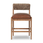 Featuring Jazelle Taupe Shearling Counter Stool by Four Hands at Amethyst Home. Bring mixed materials to the counter. Solid oak, top-grain leather and soft shearling fuse for a playful update to midcentury and Seventies styling. Overall Dimensions: 22.25"w x 25.75"d x 36.50"h. Amethyst Home provides interior design, new home construction design consulting, vintage area rugs, and lighting in the Boston metro area.
