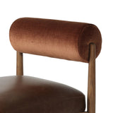 The classic counter stool gets a playful update with a bolstered cylinder seat back. Made from top-grain leather, velvet-like upholstery and warm-finished oak to elevate your bar, kitchen or dining space Amethyst Home provides interior design, new home construction design consulting, vintage area rugs, and lighting in the Austin metro area.