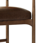 The classic counter stool gets a playful update with a bolstered cylinder seat back. Made from top-grain leather, velvet-like upholstery and warm-finished oak to elevate your bar, kitchen or dining space Amethyst Home provides interior design, new home construction design consulting, vintage area rugs, and lighting in the Scottsdale metro area.