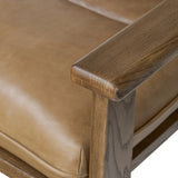 Featuring Jones Palermo Drift Chair by Four Hands at Amethyst Home. A coastal-inspired lounge chair, modernized. Angled back legs and separate cushioning create a relaxed, inviting look. Mid-level blind stitching refines the seat back. Stark amber ash frame offsets rich top-grain leather, showcasing thick-cut hide with pronounced natural texture.Overall Di. Amethyst Home provides interior design, new home construction design consulting, vintage area rugs, and lighting in the Des Moines metro area.