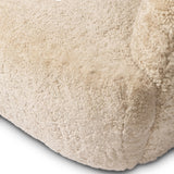 With a supple pile that's soft to the touch, taupe shearling upholstery pairs with an S-spring seat and enveloped frame for an inviting look and feel on this 360-degree swivel chair Amethyst Home provides interior design, new home construction design consulting, vintage area rugs, and lighting in the Nashville metro area.