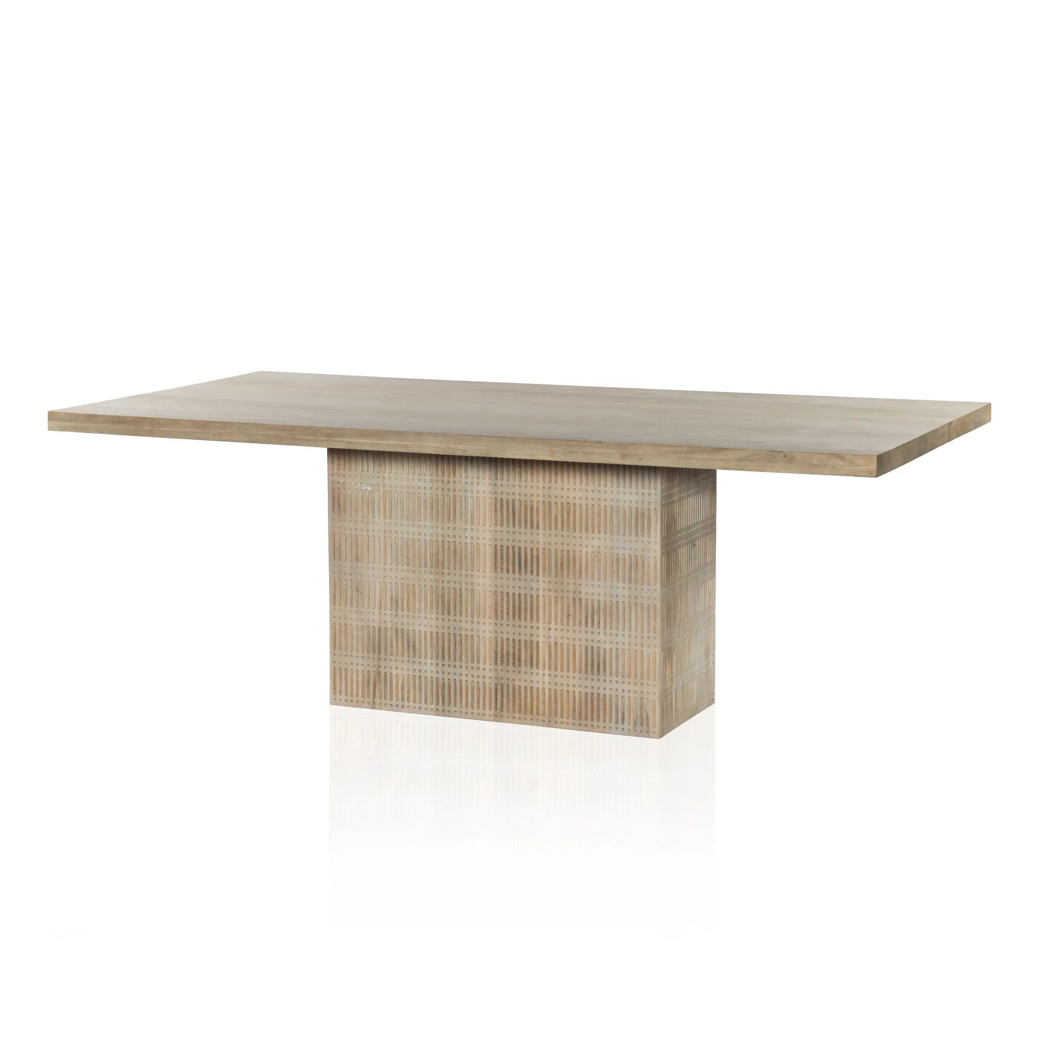 Unique linear carving with an artisan slant. Mango wood is finished in a light wash, highlighting texture and craftsmanship alike. Seats eight comfortably Amethyst Home provides interior design, new home construction design consulting, vintage area rugs, and lighting in the Miami metro area.