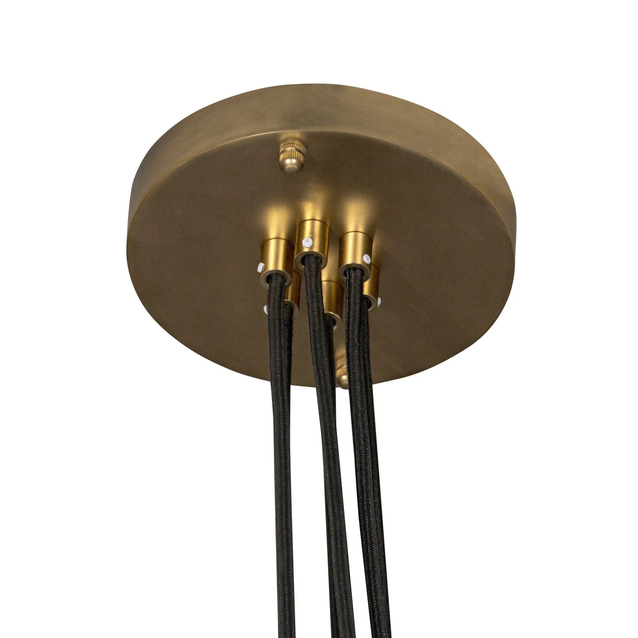 Six brass discs float on gently curved arms, suspended by adjustable black fabric cords that become an integral part of the design. The piece invites customization, allowing you to set the perfect length for your space. The bulbs nestle discreetly within each disc, creating a warm, diffused glow. G16.5 bulbs recommended Amethyst Home provides interior design, new home construction design consulting, vintage area rugs, and lighting in the Newport Beach metro area.