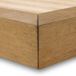 A woven, cushioned headboard in neutral cream adds texture around a floating platform base of light oak. Base features angular chamfered details, thick rails and footboard with a plinth base. Performance fabrics are specially created to withstand spills, stains, high traffic and wear, ensuring long-term comfort and unmatched durability Amethyst Home provides interior design, new home construction design consulting, vintage area rugs, and lighting in the Newport Beach metro area.