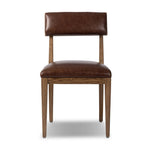 Both modern and traditional, toasted oak frames this high-back, armless dining chair. Finished with a rich brown top-grain leather, with hanging straps affixed to the back Amethyst Home provides interior design, new home construction design consulting, vintage area rugs, and lighting in the Austin metro area.