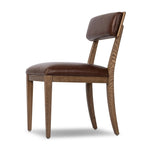 Both modern and traditional, toasted oak frames this high-back, armless dining chair. Finished with a rich brown top-grain leather, with hanging straps affixed to the back Amethyst Home provides interior design, new home construction design consulting, vintage area rugs, and lighting in the Charlotte metro area.