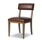 Both modern and traditional, toasted oak frames this high-back, armless dining chair. Finished with a rich brown top-grain leather, with hanging straps affixed to the back Amethyst Home provides interior design, new home construction design consulting, vintage area rugs, and lighting in the Des Moines metro area.