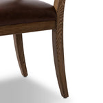 Both modern and traditional, toasted oak frames this high-back, armless dining chair. Finished with a rich brown top-grain leather, with hanging straps affixed to the back Amethyst Home provides interior design, new home construction design consulting, vintage area rugs, and lighting in the Portland metro area.