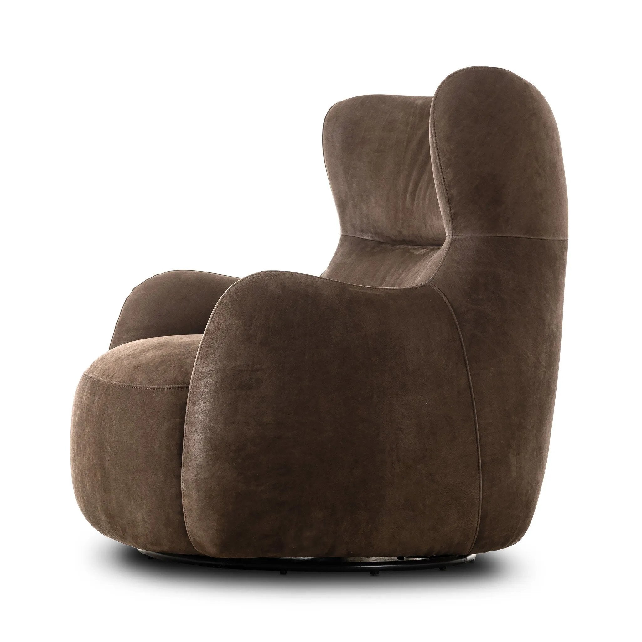 Modern wingback with a twist of barrel back design, this enveloping swivel chair comes with velvety upholstery in a deep brow