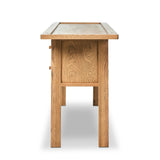 Featuring Millbrook Natural Light Oak Veneer Console Table by Four Hands at Amethyst Home. Inspired by a vintage general store counter, this console table features a heritage design with a modern twist. Thick oak legs with softened corners provide sturdy support, while oak knobs add a touch of classic charm. The inset tray top and varied drawer configurat. Amethyst Home provides interior design, new home construction design consulting, vintage area rugs, and lighting in the Kansas City metro area.