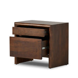 Featuring Nigel Rustic Brown Acacia Nightstand by Four Hands at Amethyst Home. A faux live edge lends natural character to the waterfall frame, its mitered corners enhancing the seamless silhouette. Soft volumes and thick proportions exude a sense of permanence, while chamfered drawer pulls add refined functionality. The warm wood tones celebrate acacia's. Amethyst Home provides interior design, new home construction design consulting, vintage area rugs, and lighting in the Kansas City metro area.