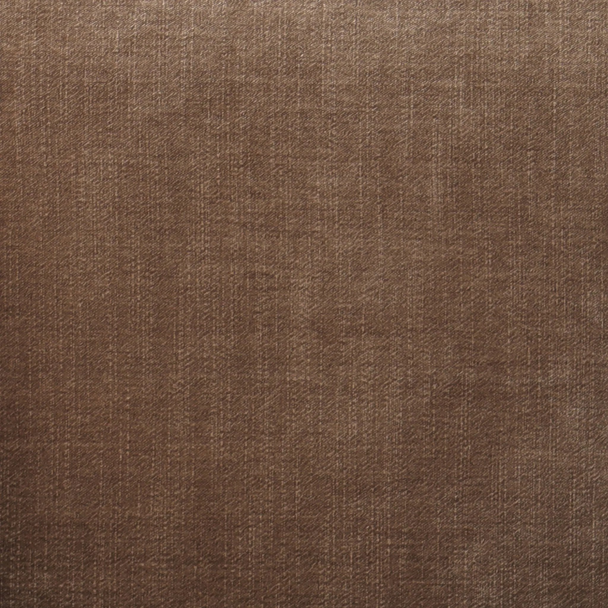 With elements of past eras at play, this updated Deco chair features a rounded back, sloped arms and a dramatic channel. The