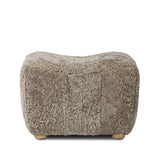 Featuring Oslo Taupe Shearling Ottoman by Four Hands at Amethyst Home. A subtle sweetheart shape paired with beige shearling plays into this ottoman's found object appeal. S-spring suspension offers a comfy place to sit and the shearling upholstery brings depth and vintage vibes throughout. Perfect styled alone or as part of a set for added drama. A design. Amethyst Home provides interior design, new home construction design consulting, vintage area rugs, and lighting in the Scottsdale metro area.