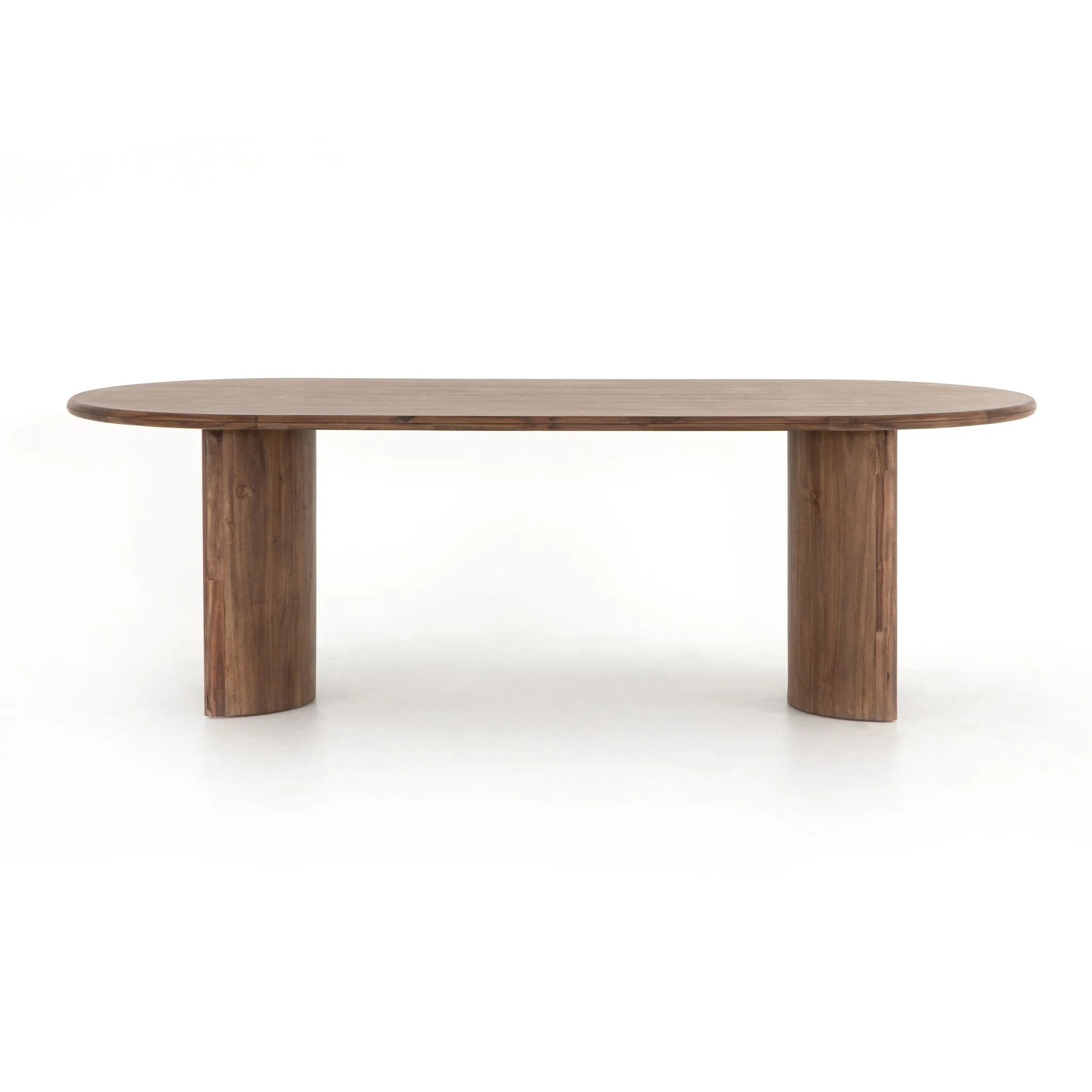 Featuring Paden Seasoned Brown Acacia Dining Table by Four Hands at Amethyst Home. A study in shape. Solid brown acacia forms crescent-shaped legs and sprawling oval tabletop, bringing organic presence to the dining room.Overall Dimensions: 94.00"w x 42.00"d x 30.00"hWeight : 139.33 lbsMaterials : Thin Acacia Veneer, Solid Acacia. Amethyst Home provides interior design, new home construction design consulting, vintage area rugs, and lighting in the Boston metro area.