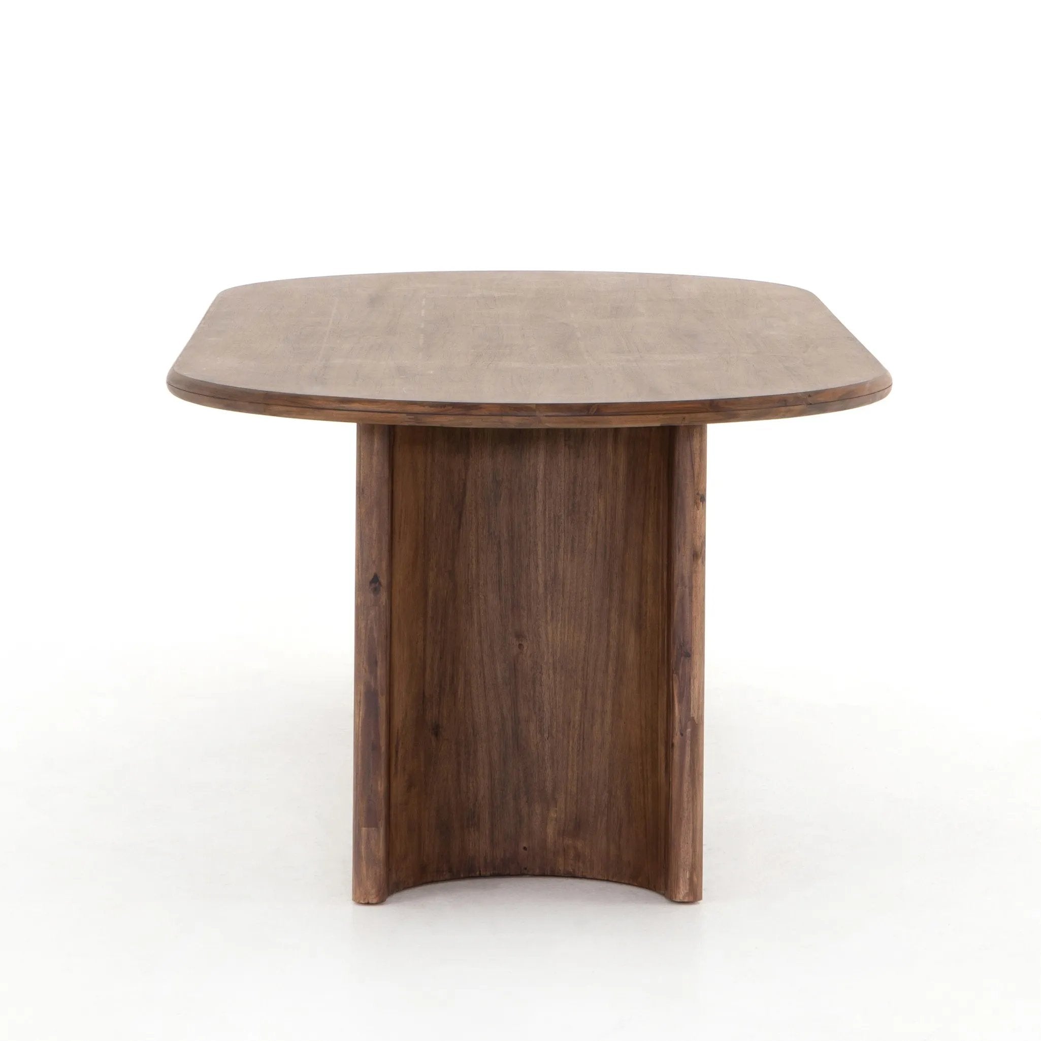 Featuring Paden Seasoned Brown Acacia Dining Table by Four Hands at Amethyst Home. A study in shape. Solid brown acacia forms crescent-shaped legs and sprawling oval tabletop, bringing organic presence to the dining room.Overall Dimensions: 94.00"w x 42.00"d x 30.00"hWeight : 139.33 lbsMaterials : Thin Acacia Veneer, Solid Acacia. Amethyst Home provides interior design, new home construction design consulting, vintage area rugs, and lighting in the Houston metro area.